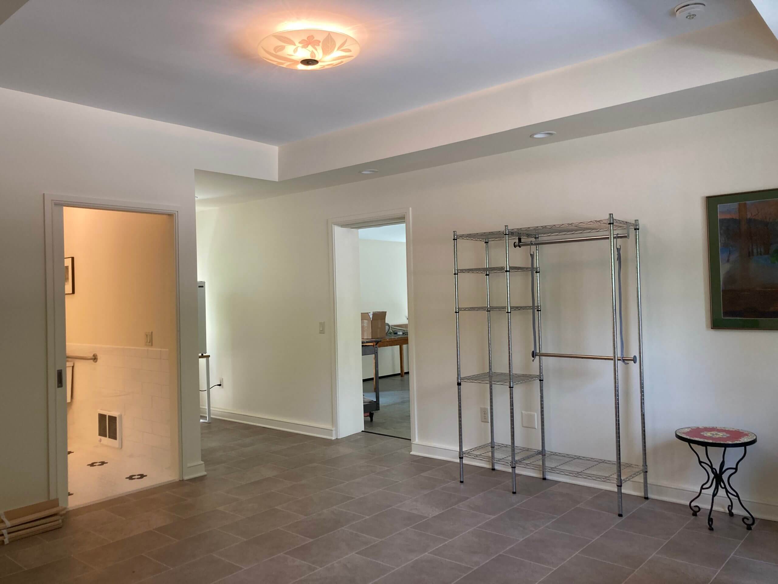 art studio with new addition seen through large windows